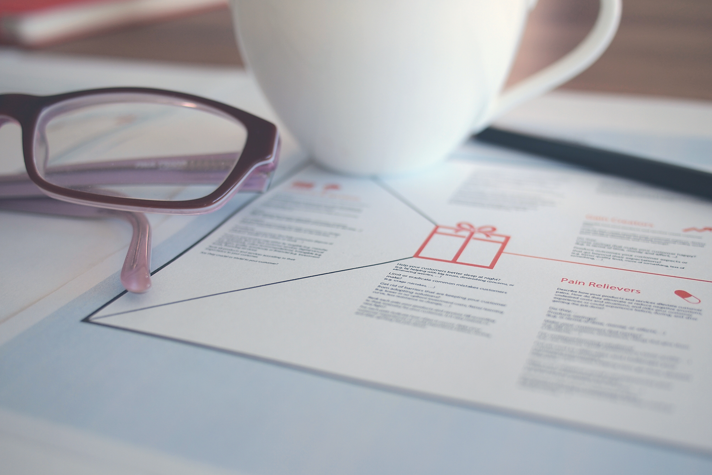glases, coffee and brochure 