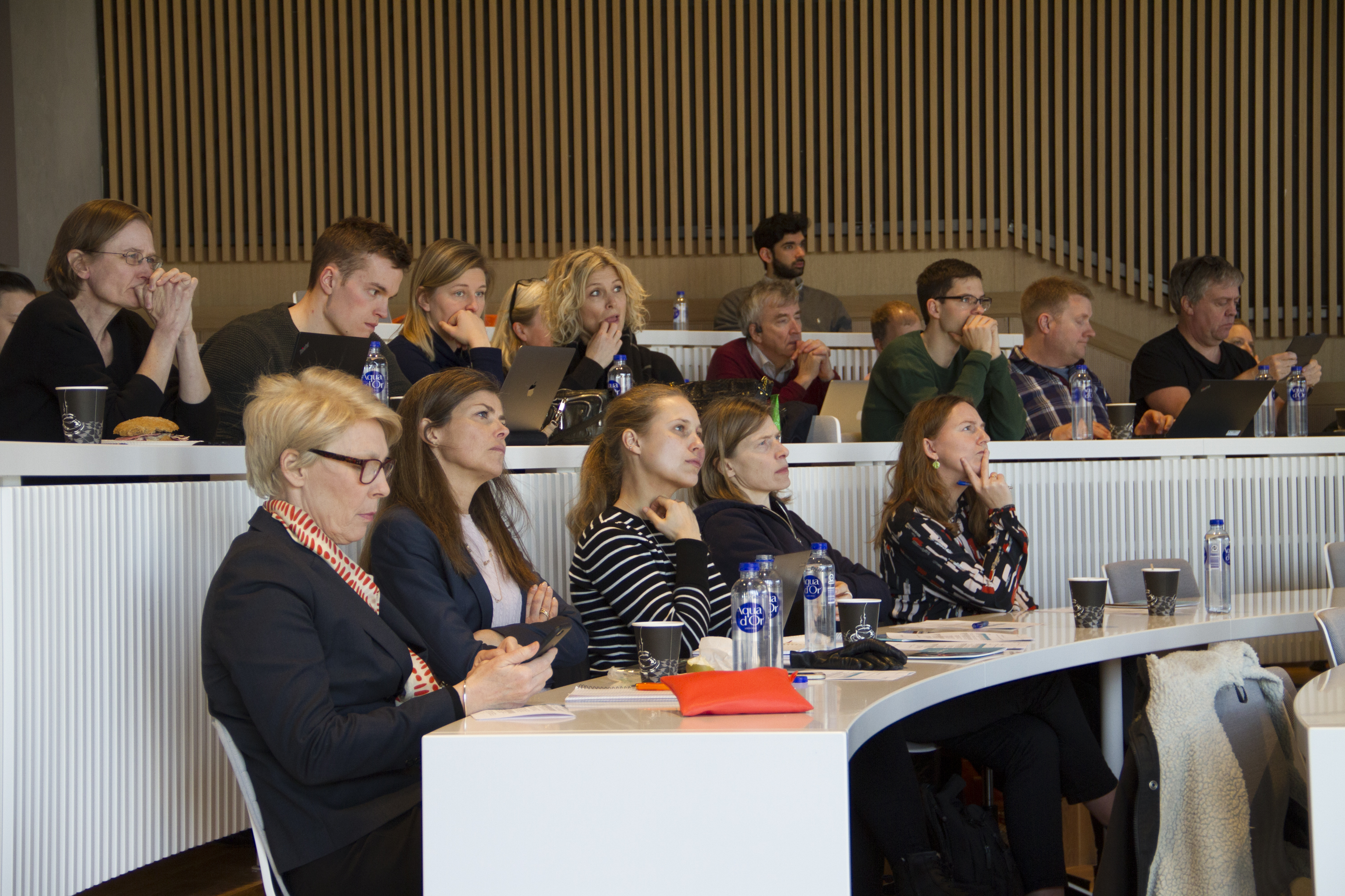 CACHET researchers listening to a talk