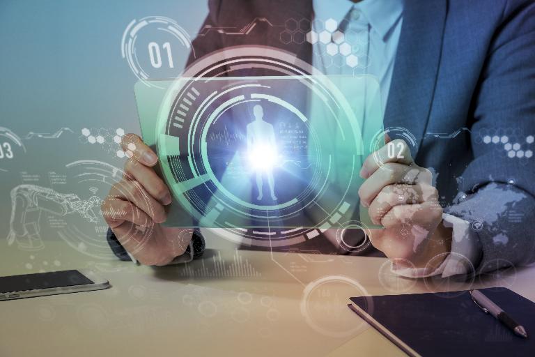 man looking at futuristic analysis of a body