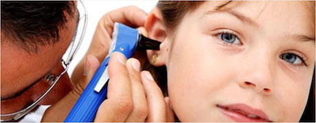 Hearing, doctor checking Childs ear