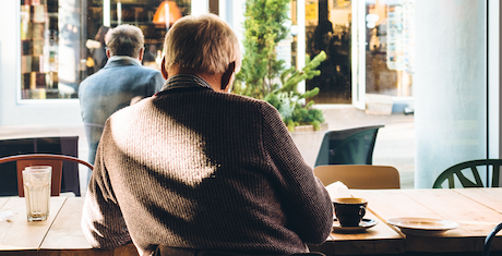 REACH, man sitting in a coffee shop