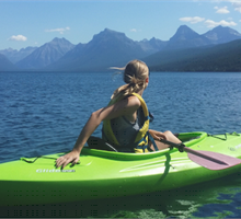 young woman kayaking