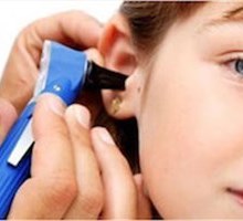 Hearing, doctor checking Childs ear